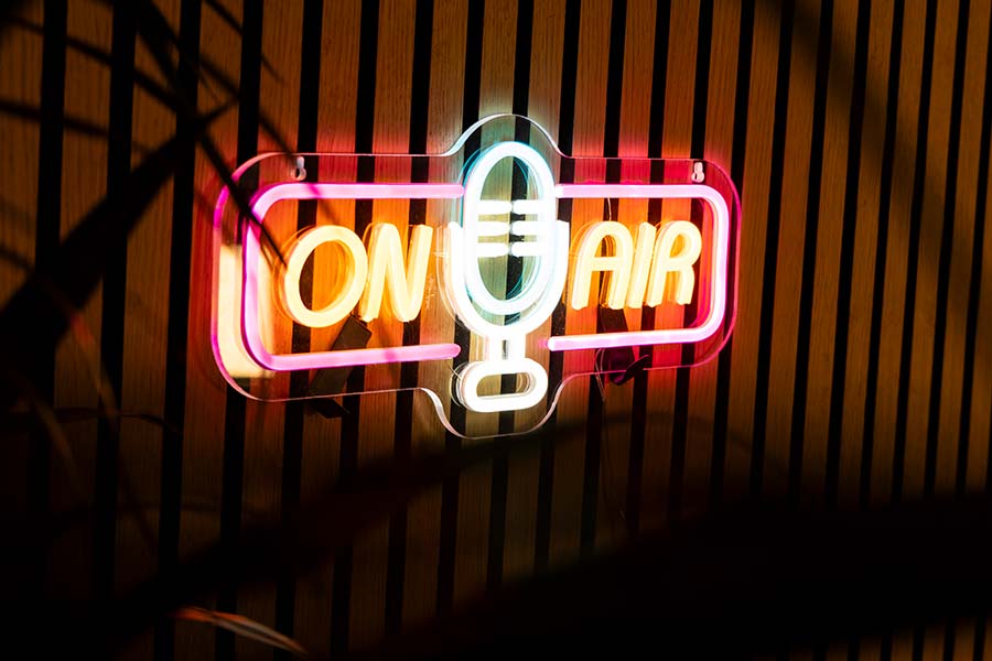 A neon sign that reads, "On Air"